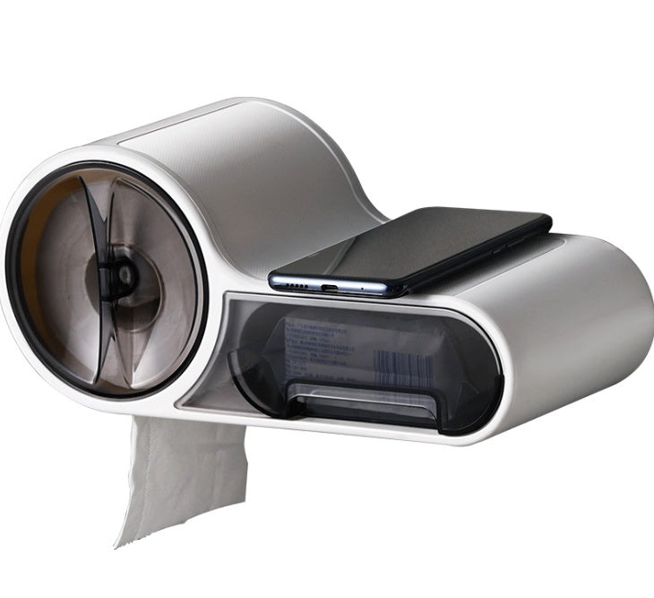 Silver tissue holder with a smartphone on a white background