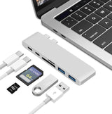 USB hub with multiple ports and connectors on a white background