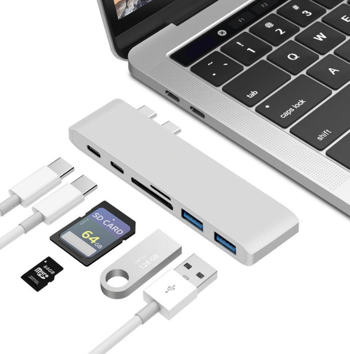USB hub with multiple ports and connectors on a white background