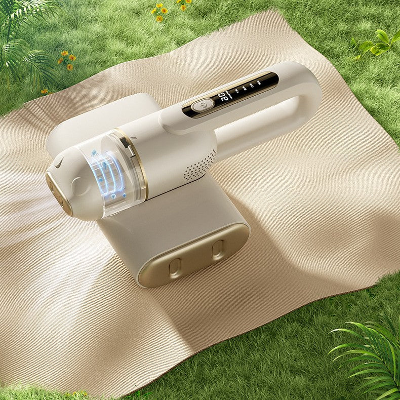 Handheld vacuum cleaner on a mat with grass background