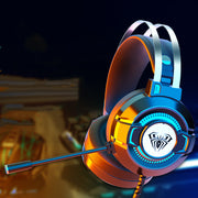 Gaming headset with orange and blue lights on a dark background