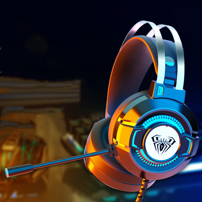Gaming headset with orange and blue lights on a dark background