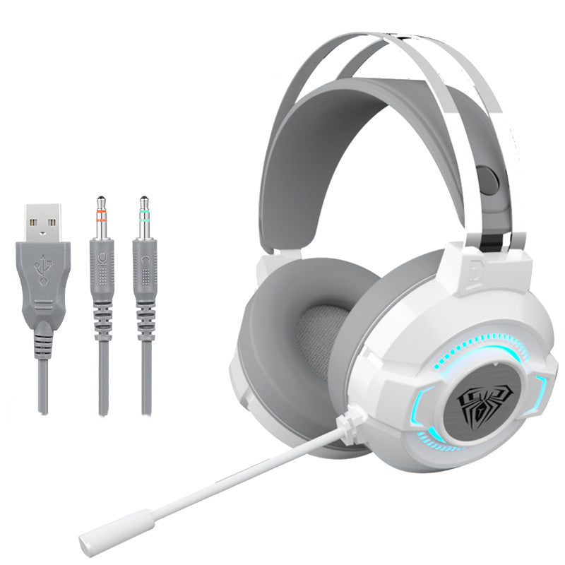 Gaming headset with microphone, USB cable, and audio cable on a white background