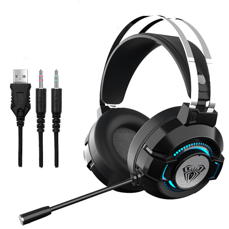 Gaming headset with microphone, USB and 3.5mm cables on a white background