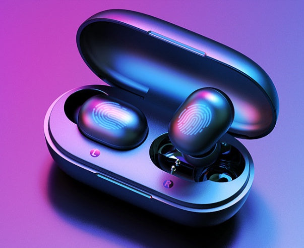 Wireless earbuds in a charging case on a purple background