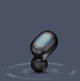 Black wireless earbud with fingerprint sensor on a dark gray background