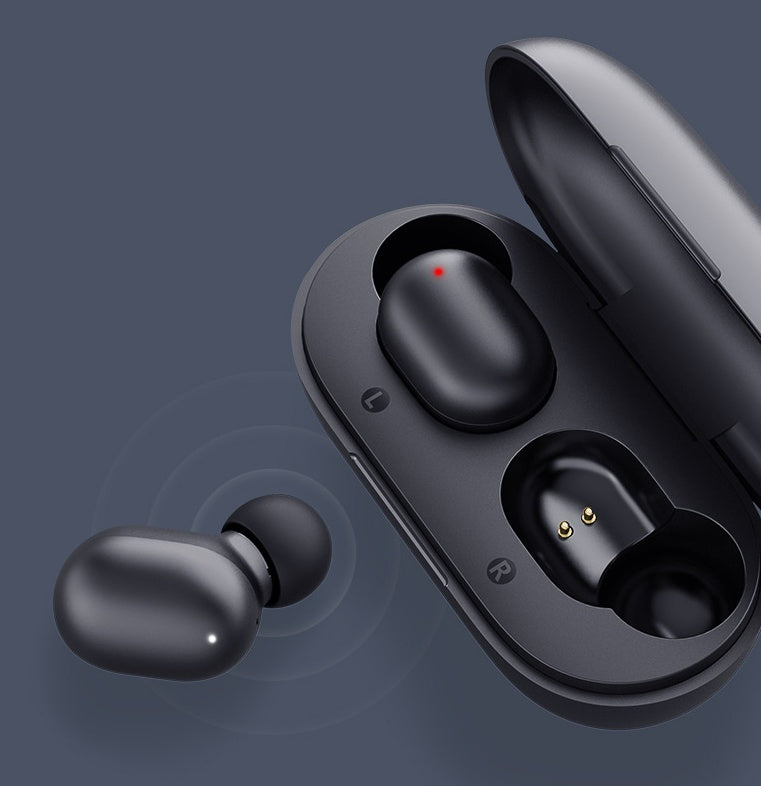 Black wireless earbuds with charging case on a dark background