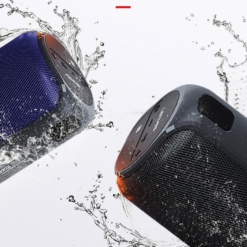 Two portable speakers, one blue and one black, with water splashes around them on a white background.
