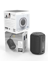 Black portable speaker with its packaging on a white background
