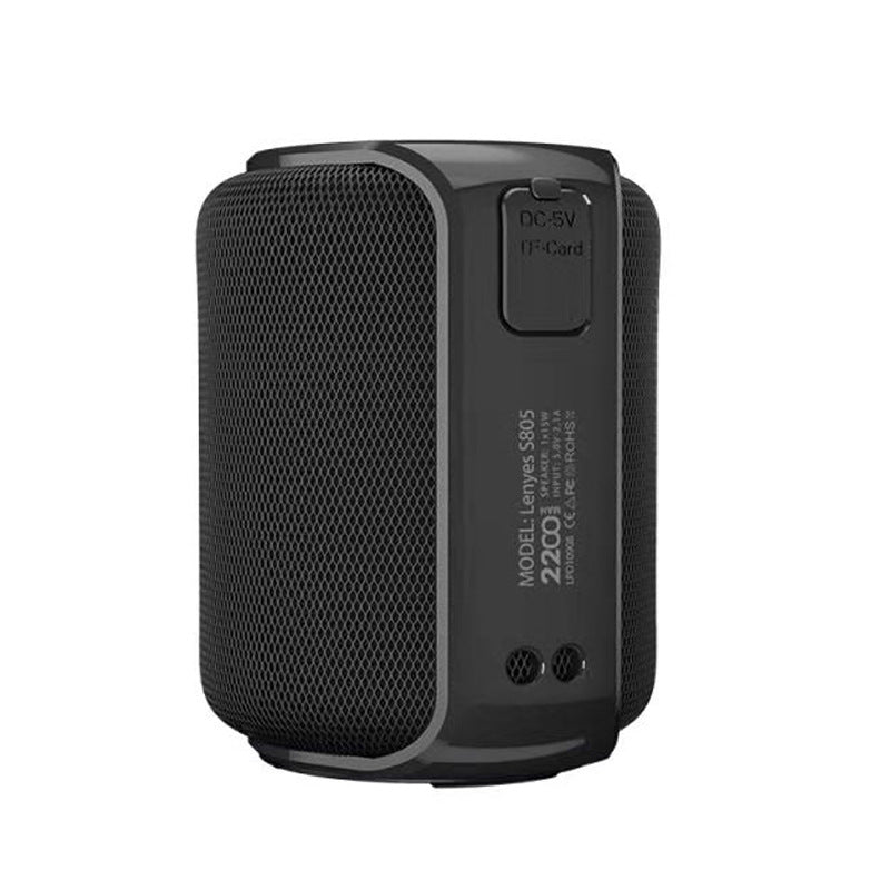 Black portable speaker on a white background