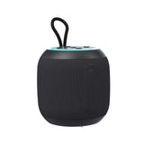 Black portable speaker with a textured surface on a white background