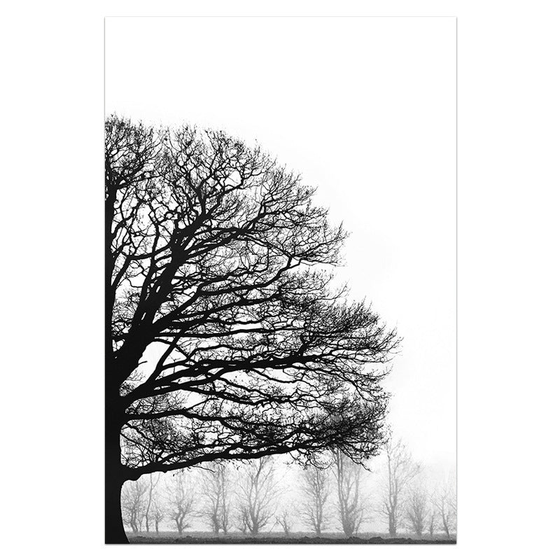 Black and white silhouette of a tree against a white background