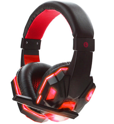 Black and red gaming headset with illuminated accents on a white background