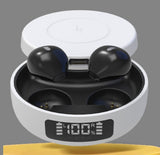 Black wireless earbuds in a white charging case with digital display on a gray background