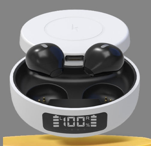 Black wireless earbuds in a white charging case with digital display on a gray background
