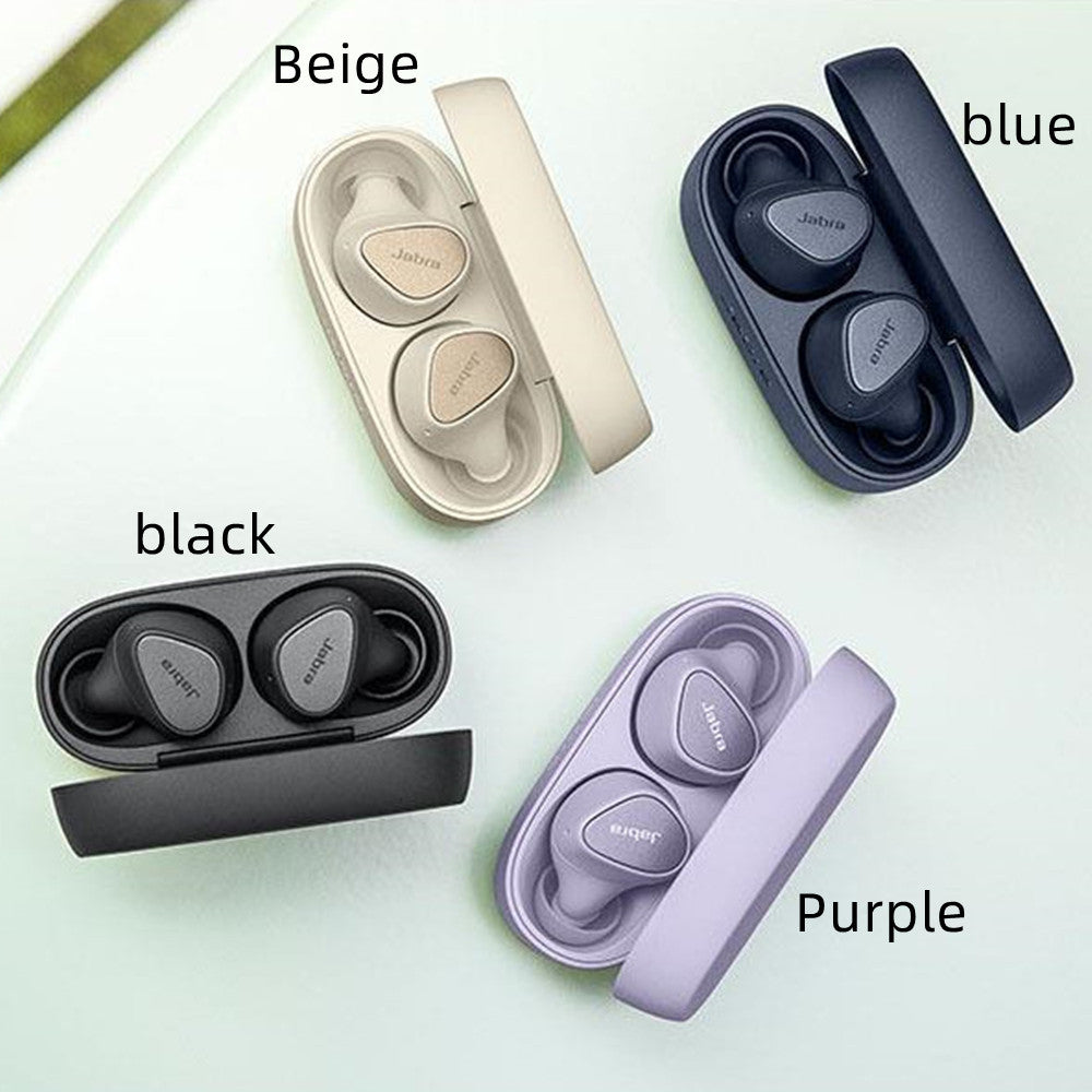 Four pairs of wireless earbuds in different colors with labeled cases on a light green background.