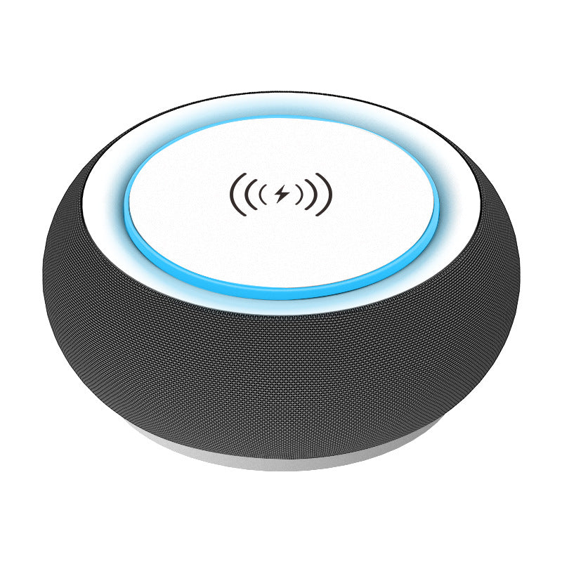 Black smart speaker with a blue light on a white background