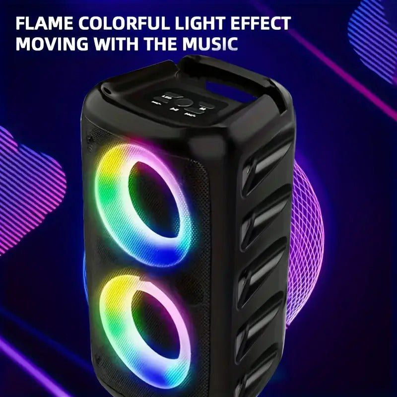 Black portable speaker with colorful light effects on a dark background