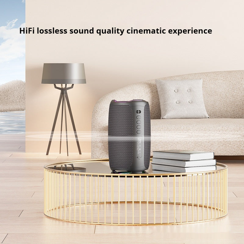 Smart speaker on a coffee table with 'HiFi lossless sound quality cinematic experience' text