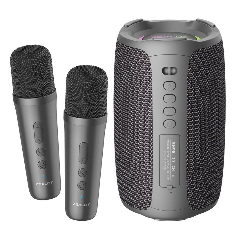 Two wireless microphones and a portable speaker with Zealot branding on a white background
