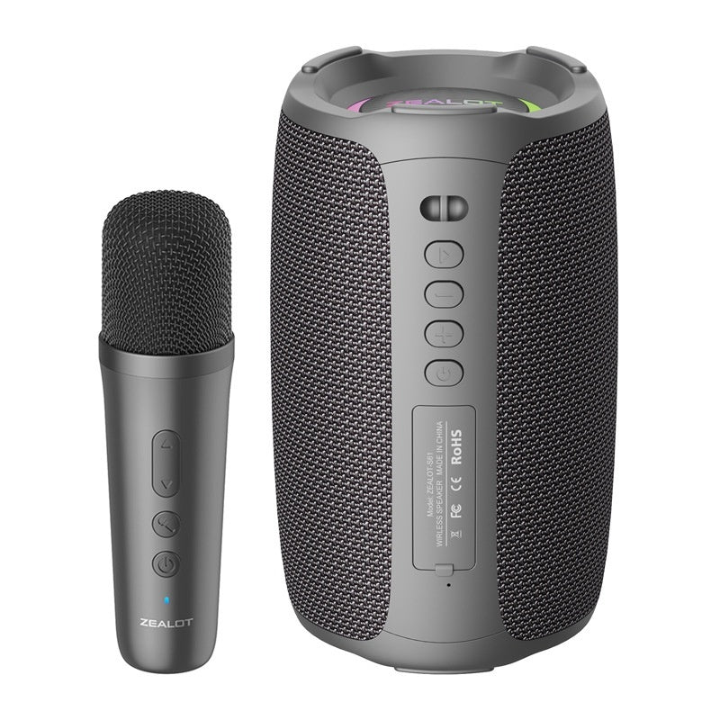 Gray portable speaker with microphone on a white background