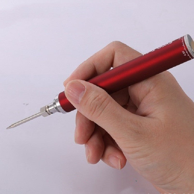 Hand holding a red screwdriver against a white background