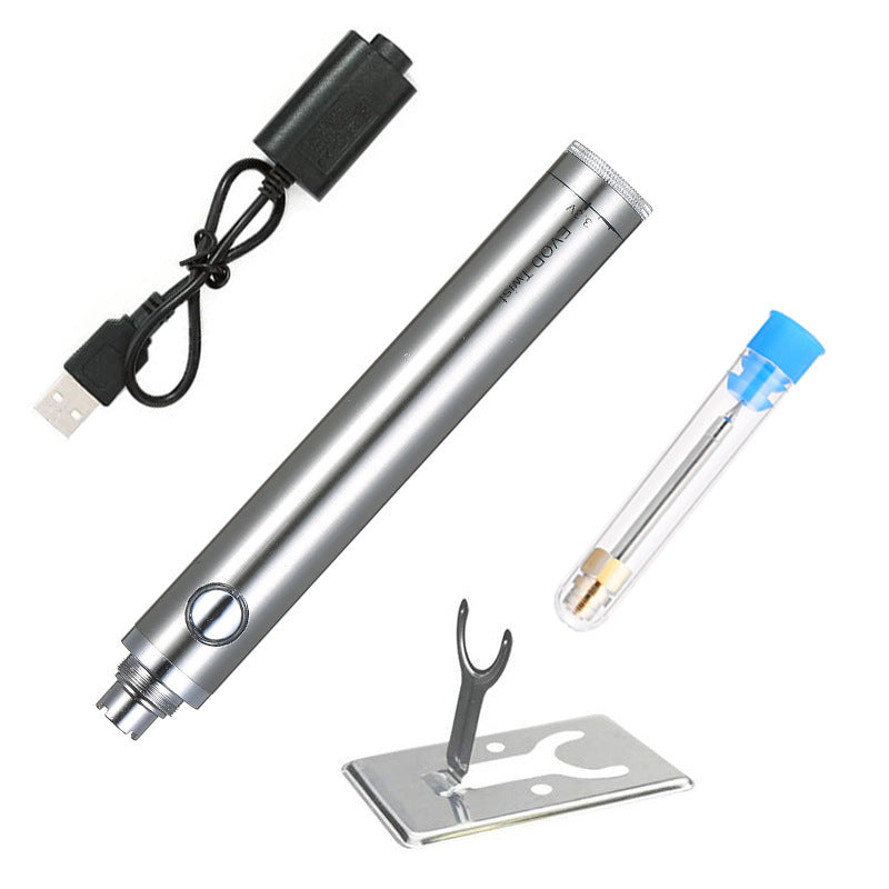 Silver pen-like device with USB cable, clear tube with blue cap, and metal stand on a white background