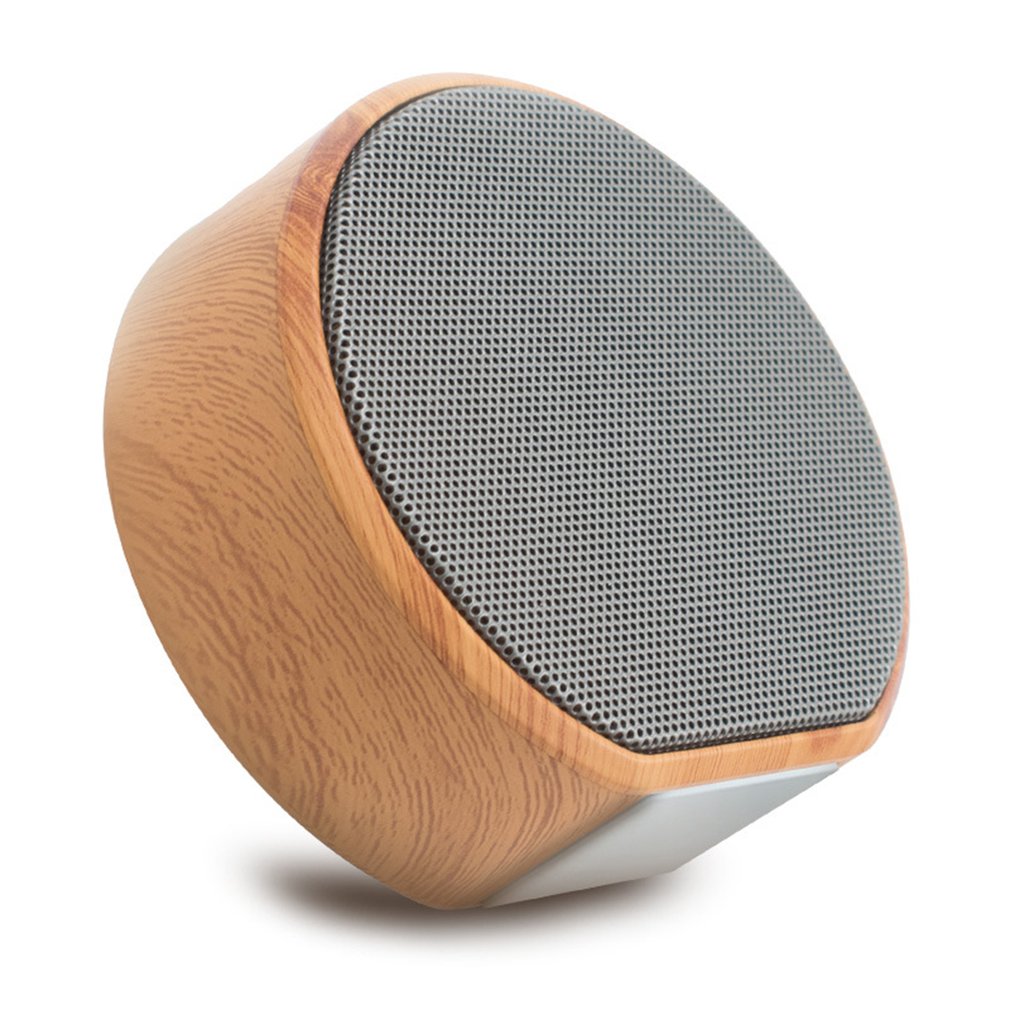 Wooden speaker with gray mesh on a white background
