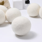 White laundry detergent balls on a white background