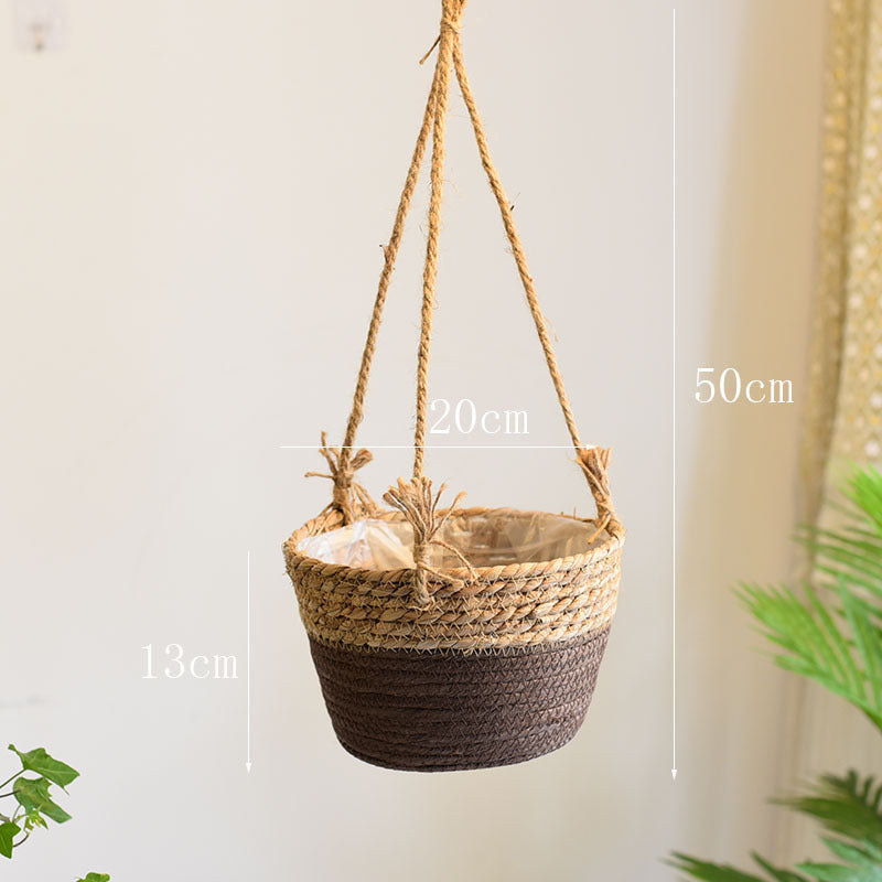 Woven hanging basket with measurements on a plain background
