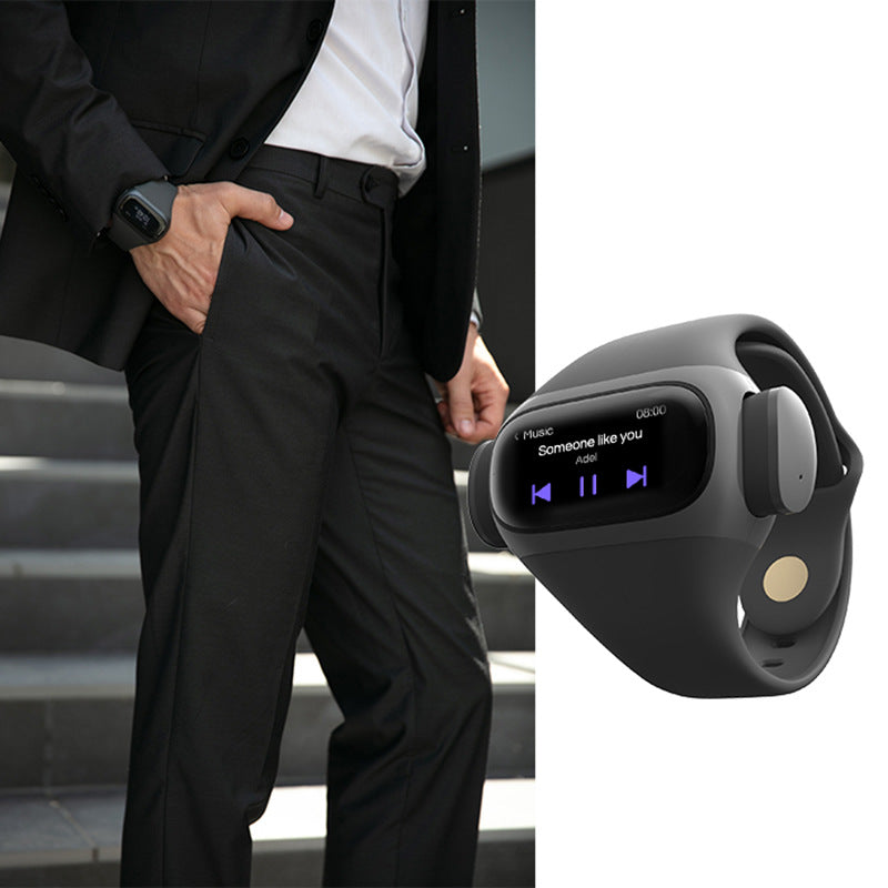 Person wearing a black smartwatch with a close-up of the device showing a music player interface.