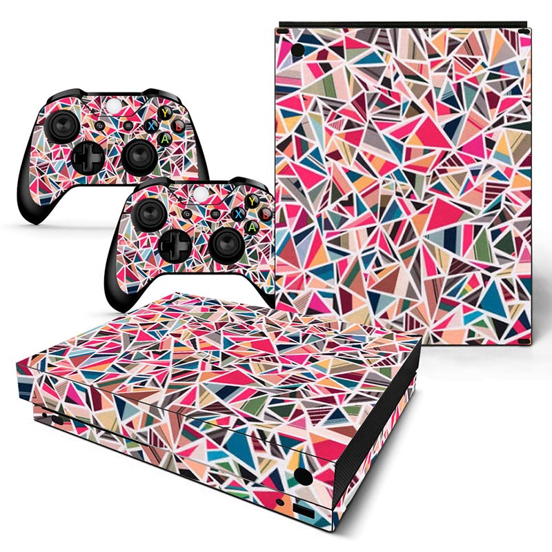 Gaming console and controllers with colorful geometric pattern