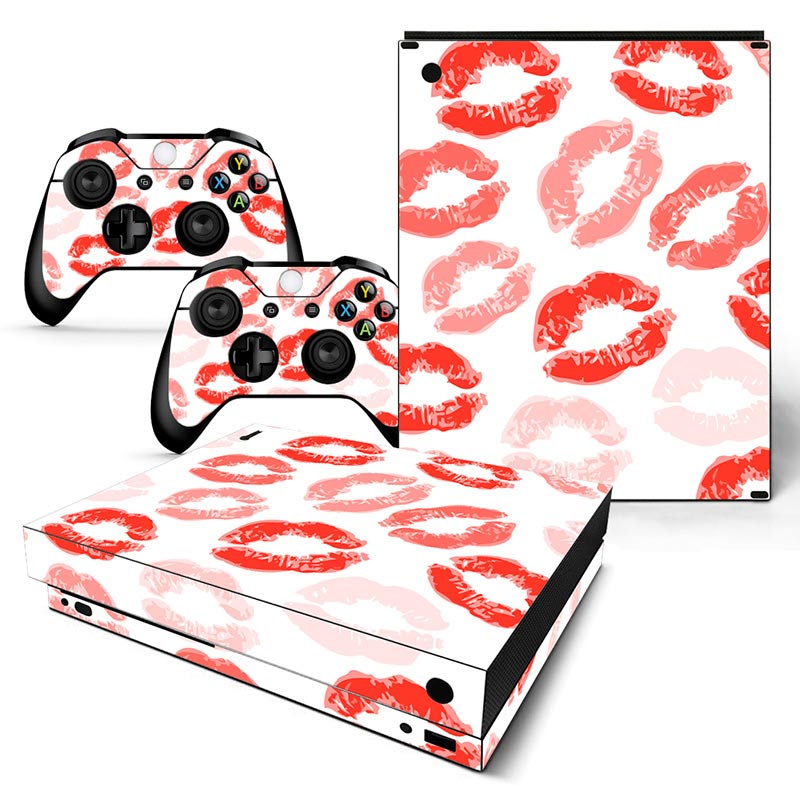 Gaming console and controller skin with red lipstick kiss marks on a white background